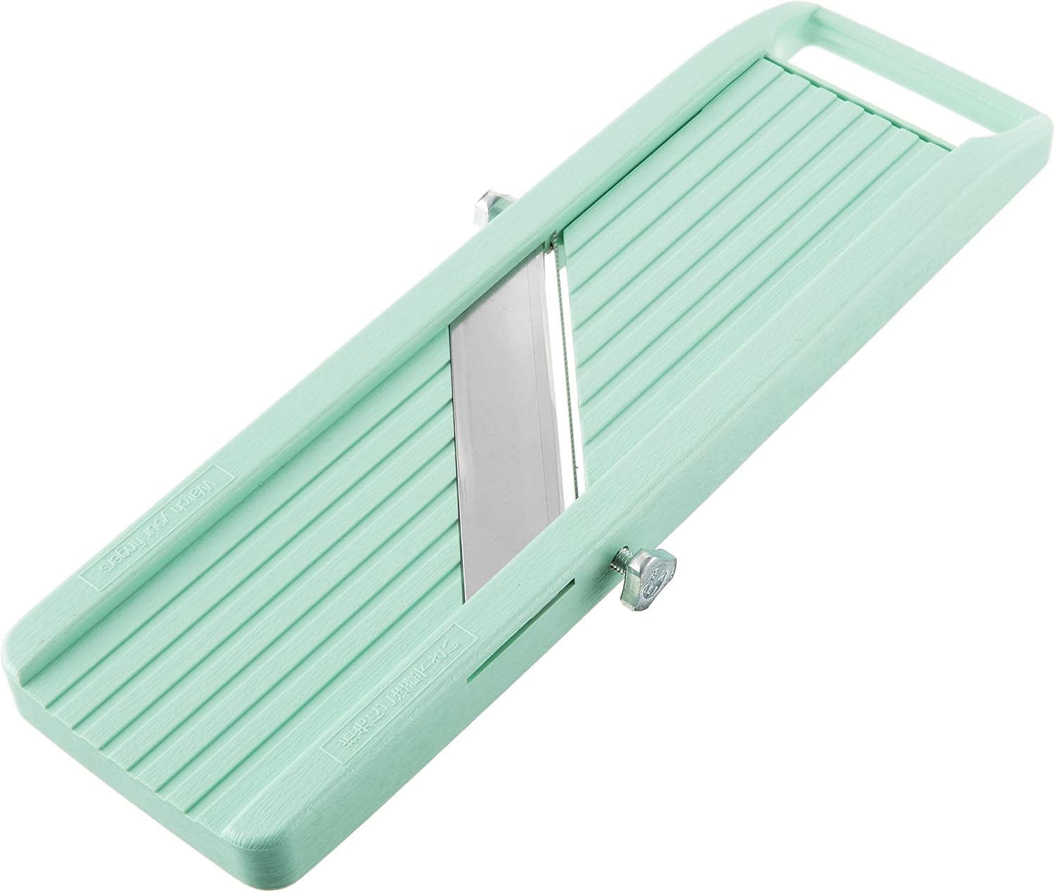 Mint green older-generation Benriner vegetable slicer with a wingnut on each side of the blade and a Watch your fingers warning molded into the body